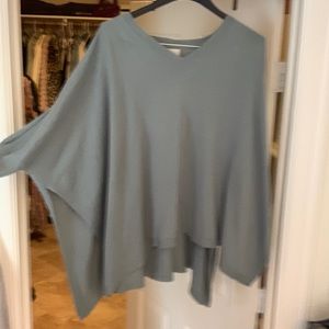 A new day one size poncho fits like XL